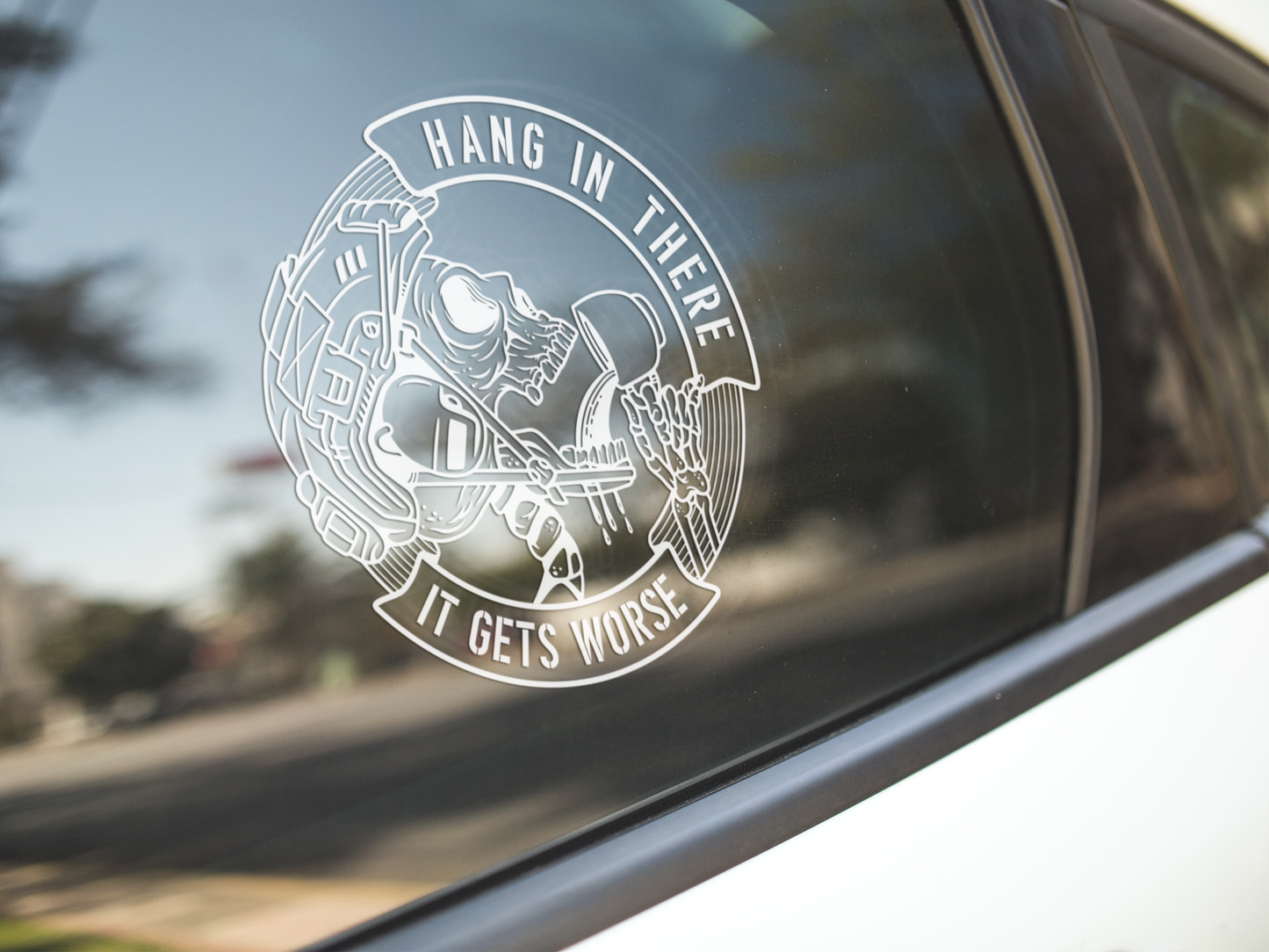 Hang In There It Gets Worse | Tactical Skull Transfer Sticker for Cars, Windows, Laptops & Gear