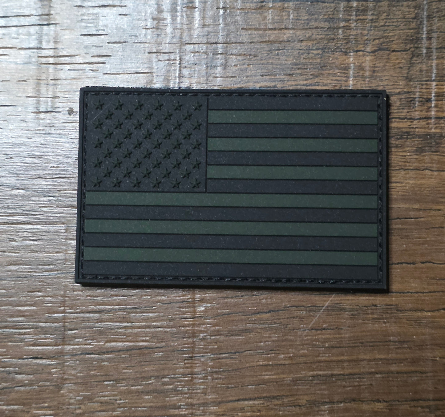 Tactical Subdued U.S. Flag – Black & OD Green Hook and Loop Patch